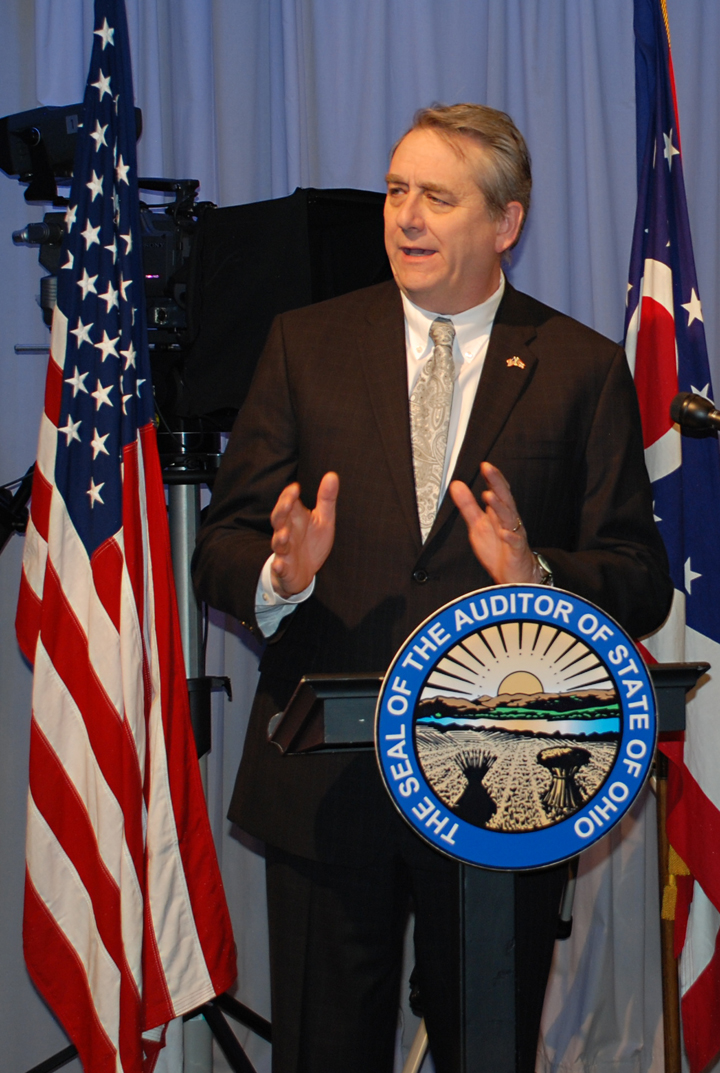 Dave Yost speaking at a press conference
