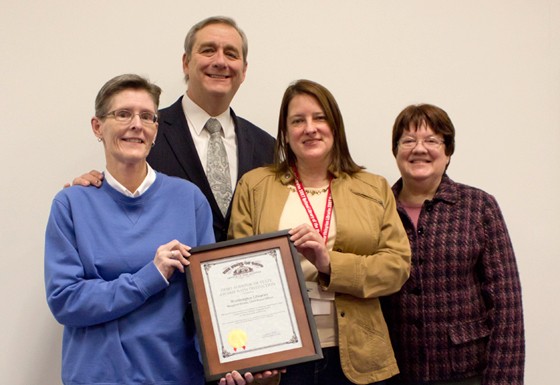 Auditor Dave Yost presenting the Auditor of State Award with Distinction to Worthington Libraries in Franklin County.